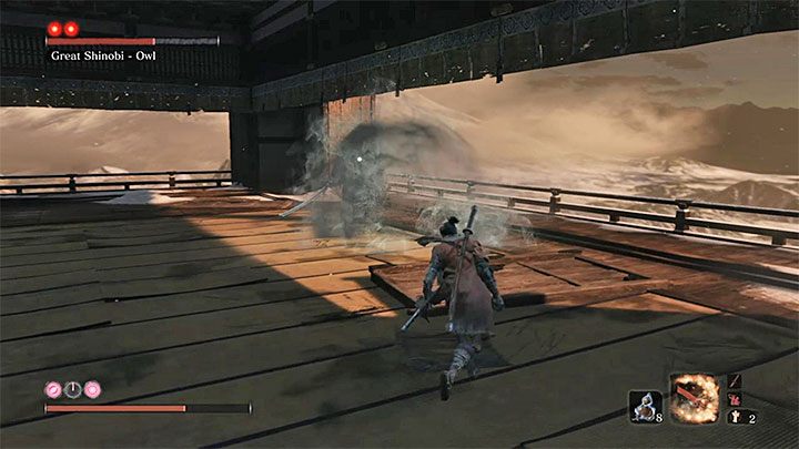 An unusual attack of the boss is hurling a container with poison at you - Great Shinobi Owl | Sekiro Shadows Die Twice Boss Fight - Bosses - Sekiro Guide and Walkthrough
