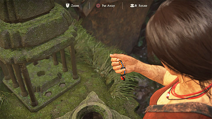 After finding all the tokens, go back to the same room and interact with the socle at the bottom of the map - this will transfer the tokens to the stone map - How to find the Queens Ruby (simpler treasure hunts)? | FAQ - FAQ - Frequently Asked Questions - Uncharted: The Lost Legacy Game Guide