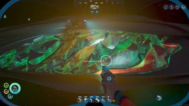 The player in Subnautica 2 scans the broken section of the Karakorum Power Plant Turbine with their Bioscanner.