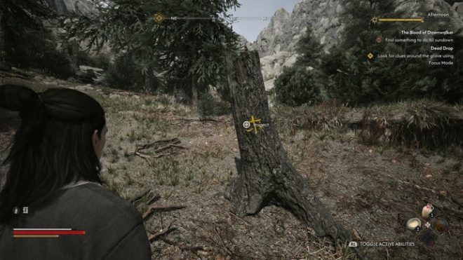Coen looks at a tree carving in The Blood of Dawnwalker.