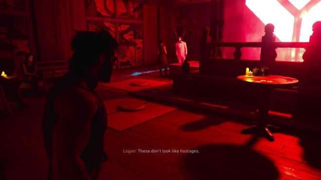 Logan inside a red-lit room in Marvel's Wolverine.