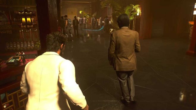 Logan walking around the upper platform in a casino in Marvel's Wolverine.