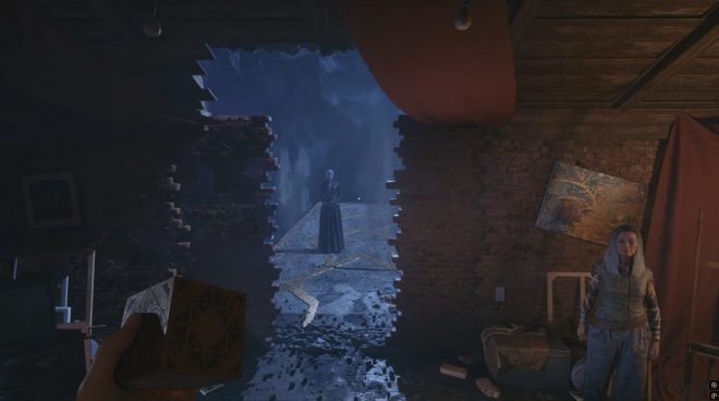 Image showing Aidan holding the puzzle box in the apartment as a Cenobite waits beyond the opening in the wall and the Merchant stands nearby in Hellraiser: Revival